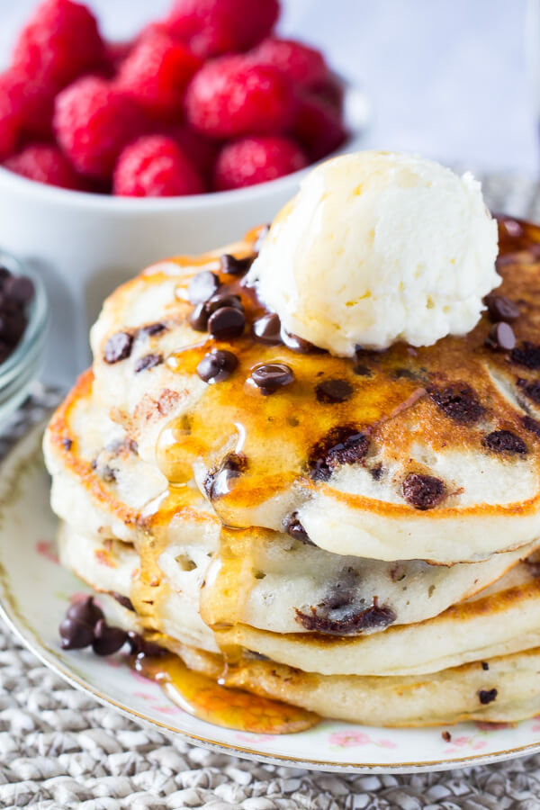 Picture of four pankcakes with icecream and chocolate chips.